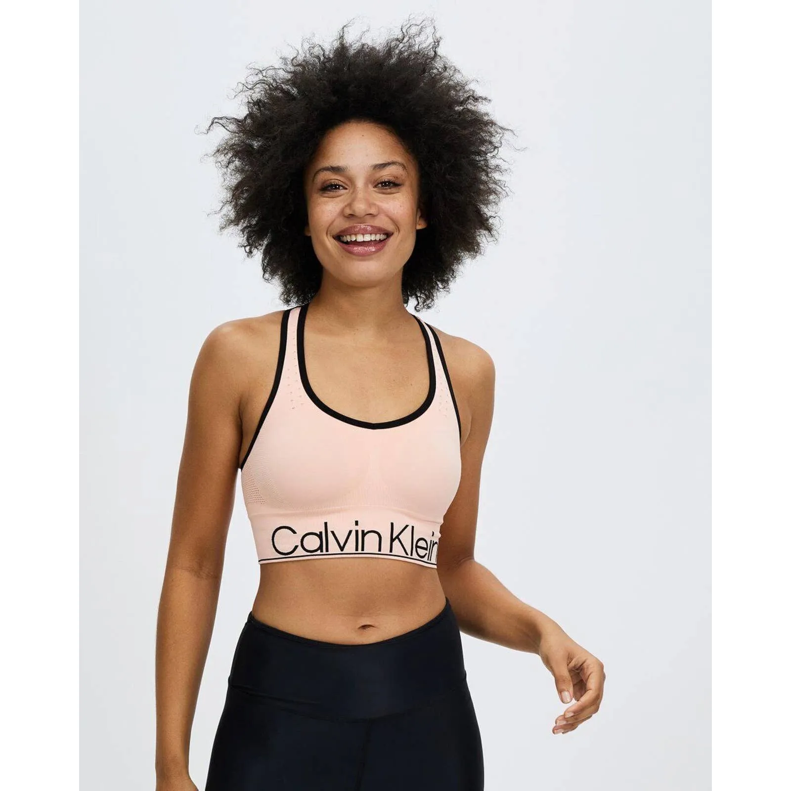 Calvin Klein Women's Mid-Impact Sports Bra Peach