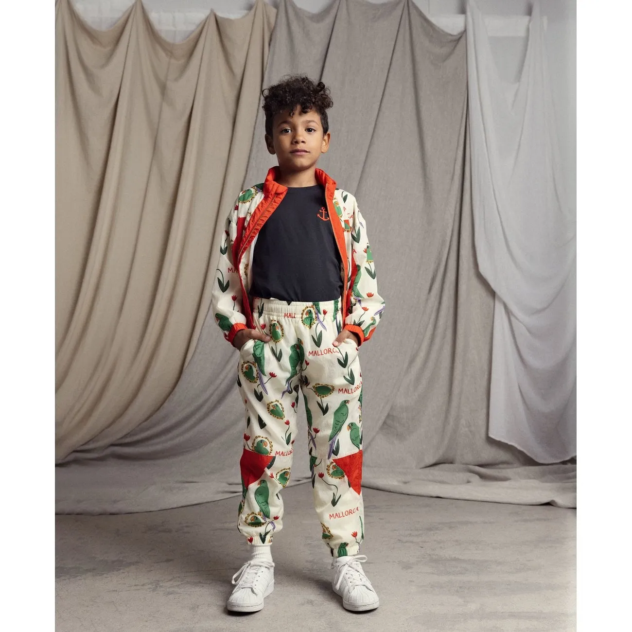 Mini Rodini Multi Parrots AOP Nylon Tracksuit Pants